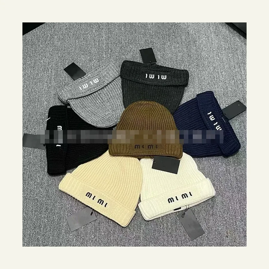 Miu Miu letter-embroidered, catalog ID 5971
